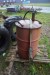 Old iron. Seeds, lifts, tires, oil barrel with pump