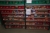 Large lot of ball bearings in shelving. Shelving included