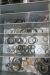 Rack with assortment boxes containing various screws, washers, couplings, etc.