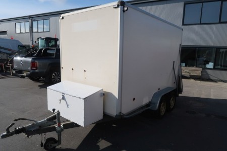 Cargo trailer with ramp.