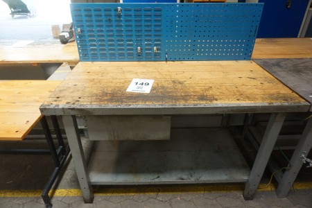 Wooden file bench with drawer and tool board.
