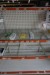 Exhibition shelf with perforated plates and shelves + 1 pc. end shelving.