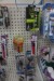Content of various shampoos, brushes, sprays, etc. for dogs. on bookshelf