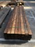Thermally treated patio boards with light oil