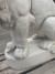 Large seated lion, cast white concrete
