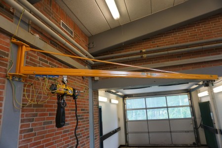 Wall swing crane with air-controlled hoist.