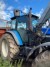 Traktor, Marke: New Holland, Modell 8560. Mit Quicke-Frontlader Modell: Q75.