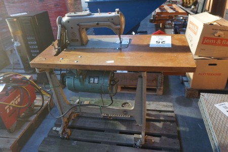 Sewing machine on table, brand: PFAFF