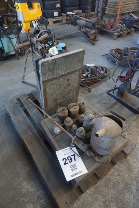 Old-fashioned scales with accompanying weights