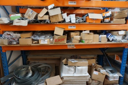 Content on shelf of various smoking fittings, binders, neck clamps.