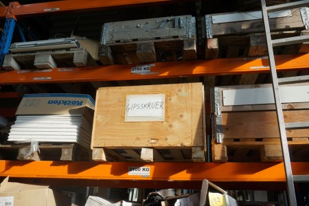 Contents on shelf of various plaster screws, nails, plates, etc.
