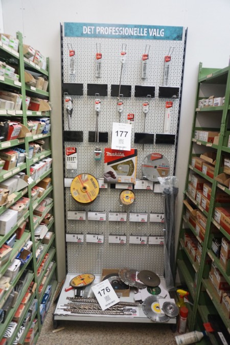 Exhibition shelf containing various new Makita drills