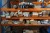Content on the shelf of various fittings, rails, roof tile binders, etc.