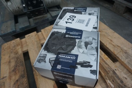 2 boxes with spare part for Husqvarna