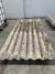 Lot of plasterboard roofing sheets and smokestacks