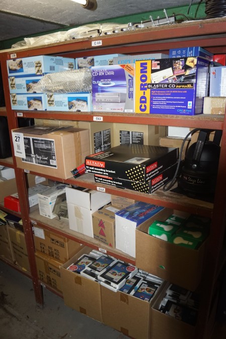 Contents in 1 subject bookcase of various cassette tape boxes, bulbs, power cables, CD-ROM box, spare parts etc.
