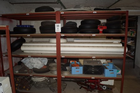 Contents in 2 compartments bookcase of Various tires, axles, spare parts etc.