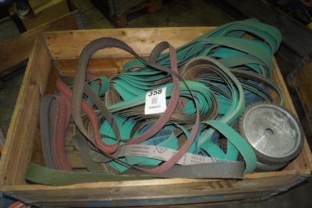 Large batch of sanding belts for belt sanders