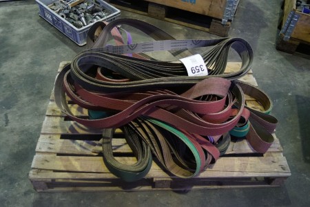 Large batch of sanding belts for belt sanders