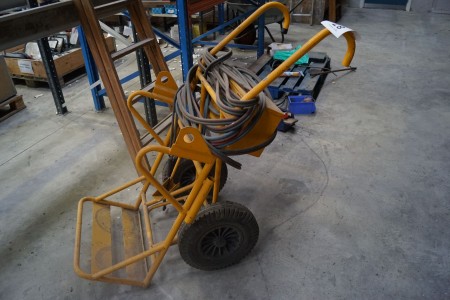 Gas and oxygen cart with various hoses