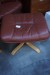 2 brown leather chairs with footstool
