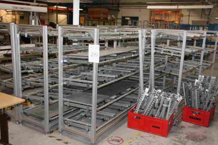 Large batch picking racks, about 9 sections + spare parts in boxes and on the floor