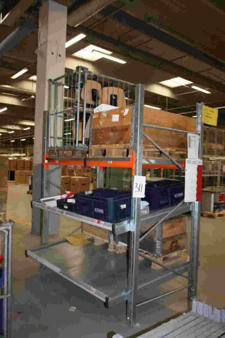 Picking Shelving with content, including grid pallet with chairs