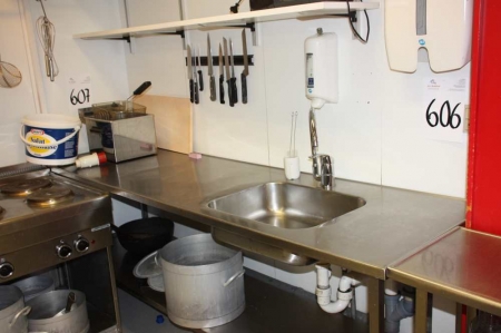 Table of stainless steel sink and tap