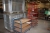 3 grid pallets with parts of steel shelving + 2 carriers