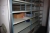 Archive shelving on rails, hand-operated. 5 sections of 3 sections. Height approx. 2.2 meters. Width / section: 3000 mm. Shelves (double), depth approx. 61 cm.