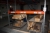 Pallet rack, 2 beams, width 3 meters, max. weight / pallet: 1000 kg. + Miscellaneous painting hanging on 2 trolleys and pallet + 2 grids on pallet + paint hooks + 1 sections steel shelving + paint hools on carriage