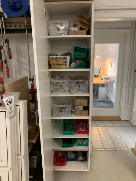 Cabinet with contents of various fittings and hangers