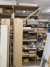 Bookcase containing various doors, dispenser, materials for cabinets, etc.