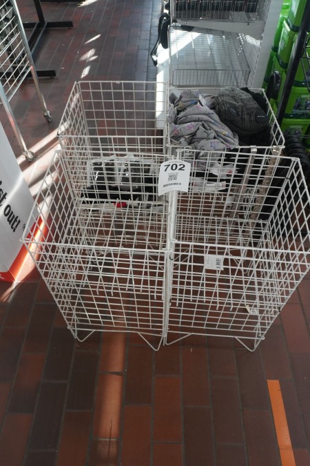4 pcs. exhibition cages containing various hats.