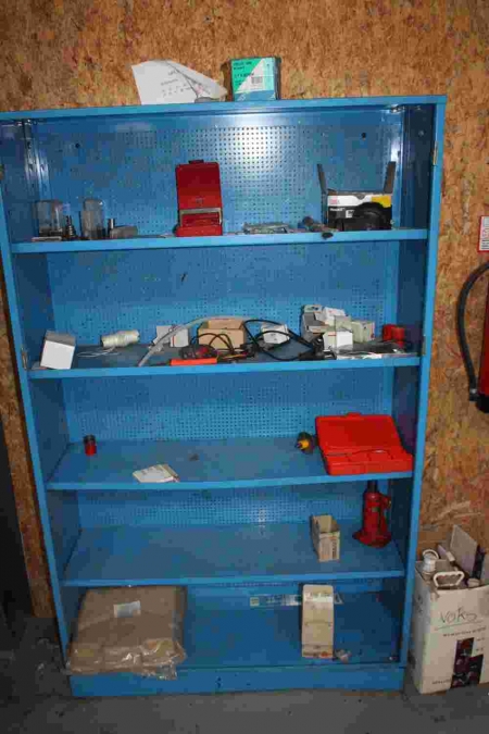 Steel Shelving with content + electric cables, etc. in holders on the wall + boxes in racks on the wall with electric parts + air hose reel on the wall