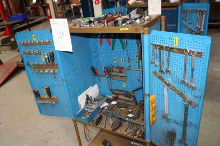 Tool cabinet on wheels containing various hand tools