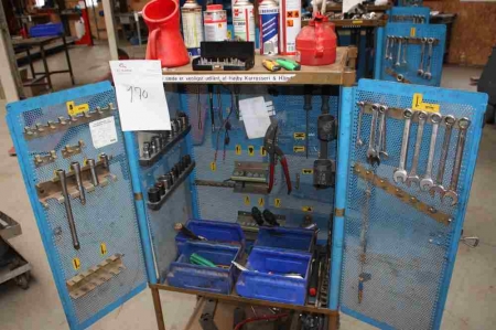 Tool cabinet on wheels containing various hand tools