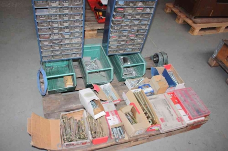 Pallet with various bolts and screws