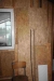 Bags of sawdust on the ceiling + lot insulation + basin + wooden panels + A-type ladder
