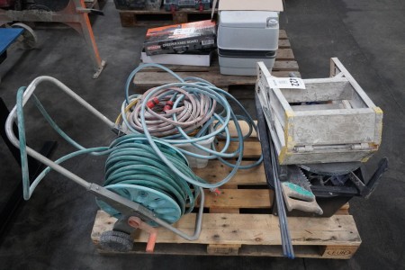Water hose reels with extra hoses + Ladder and various tools