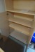 Shelving system with cabinet