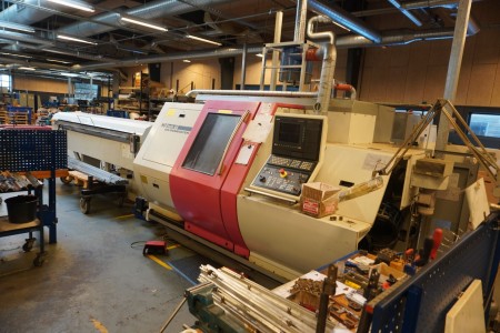 CNC Controlled Lathe Brand Gildemeister Model MF Twin 65 with bar machine