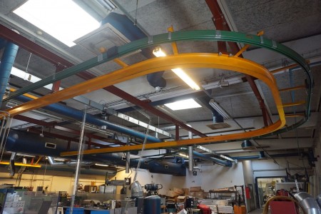 Lifting hoist on ceiling-mounted rail