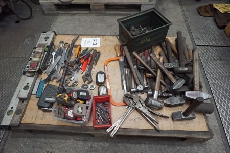 Pallet with various hand tools