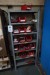 Galvanized steel shelf + cabinet with contents.