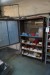 Galvanized steel shelf + cabinet with contents.