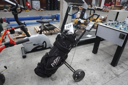 Golf cart with golf clubs
