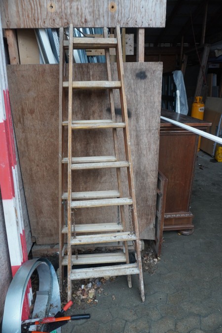 2 wooden stair ladders