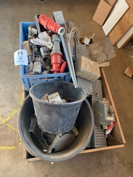 Various electric spare parts in pallet