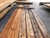 Thermally treated and oiled facade boards